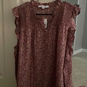 Beautiful pink blouse with purple flowers.  Brand new with tags attached.